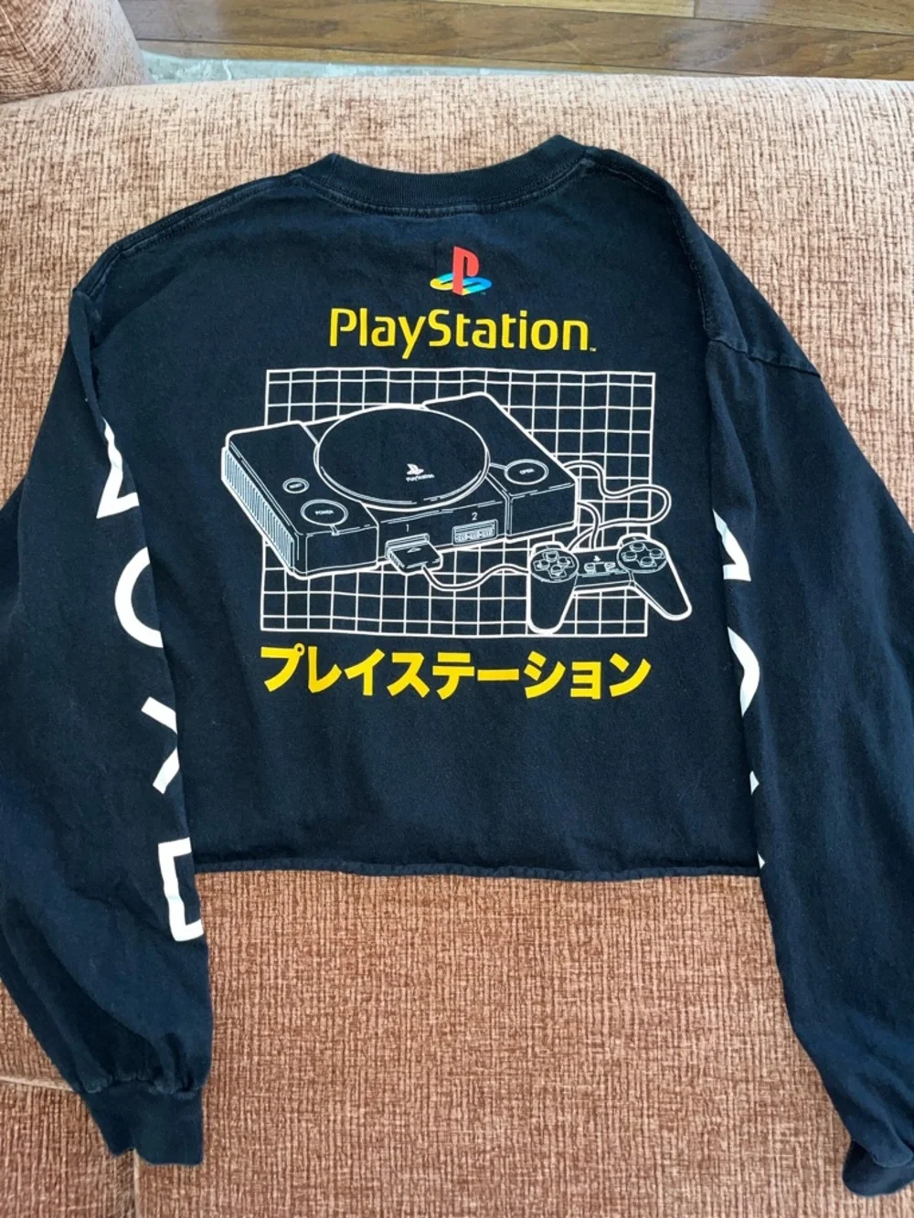 Sony PlayStation Black Sweatshirt with Multicolor Logo and Yellow Text